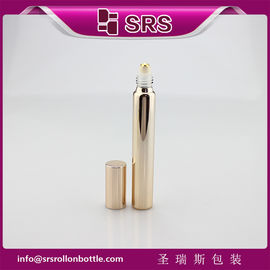 Bottiglia di vetro in oro rosa metallizzata da 15 ml di 17 mm di diametro con palla d'oro reale e tappo in alluminio.