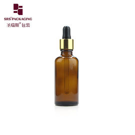 Bottiglia di essenze cosmetiche da 50 ml in vetro rotondo di colore ambra da 30 ml con contagocce
